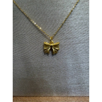 黃金蝴蝶結項鍊 - 優雅與甜美的完美結合，展現女性魅力與時尚感