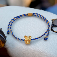 黃金老虎編繩手鍊 - 勇氣與力量的時尚潮流必備配件