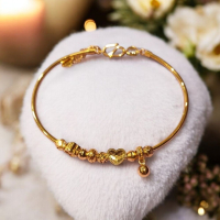 黃金愛心手環：展現您的獨特魅力與心意的奢華之選